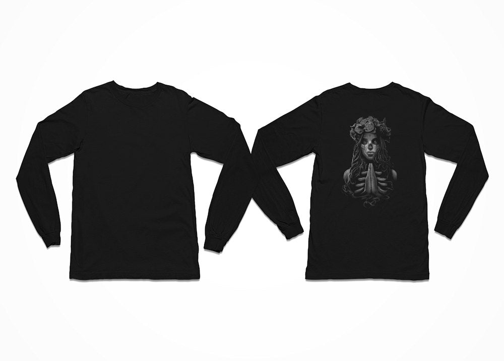 A girl prays, wearing a rose crown and in Day of the Dead Sugar Skull make-up on this tee. Longsleeve - Back Print.